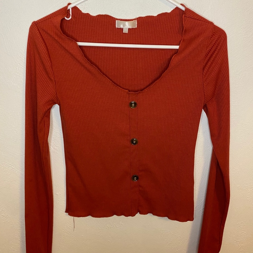Dark orange button down top